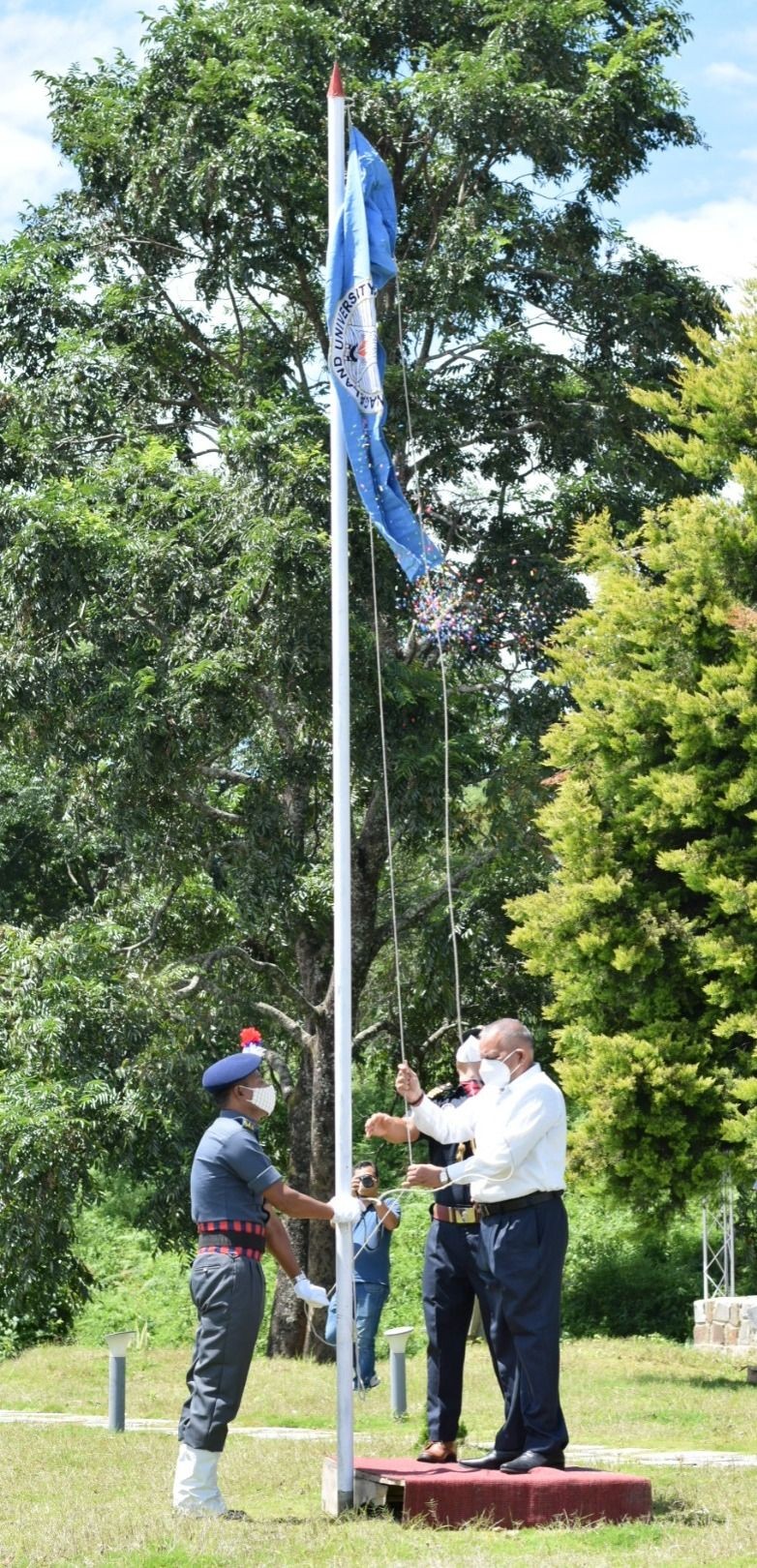 VC Prof P Lal hoisting the University flag at Lumami headquarters on September 6. (Photo Courtesy: NU, PRO)